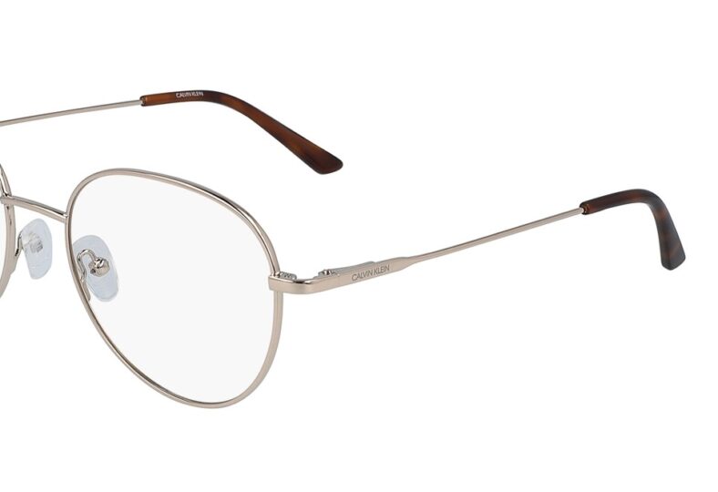 Calvin Klein gold round eyeglasses.